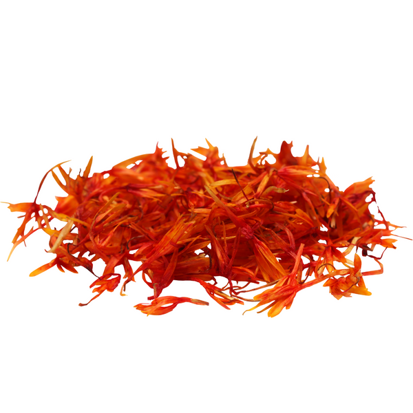 Orange saffron threads on a white background